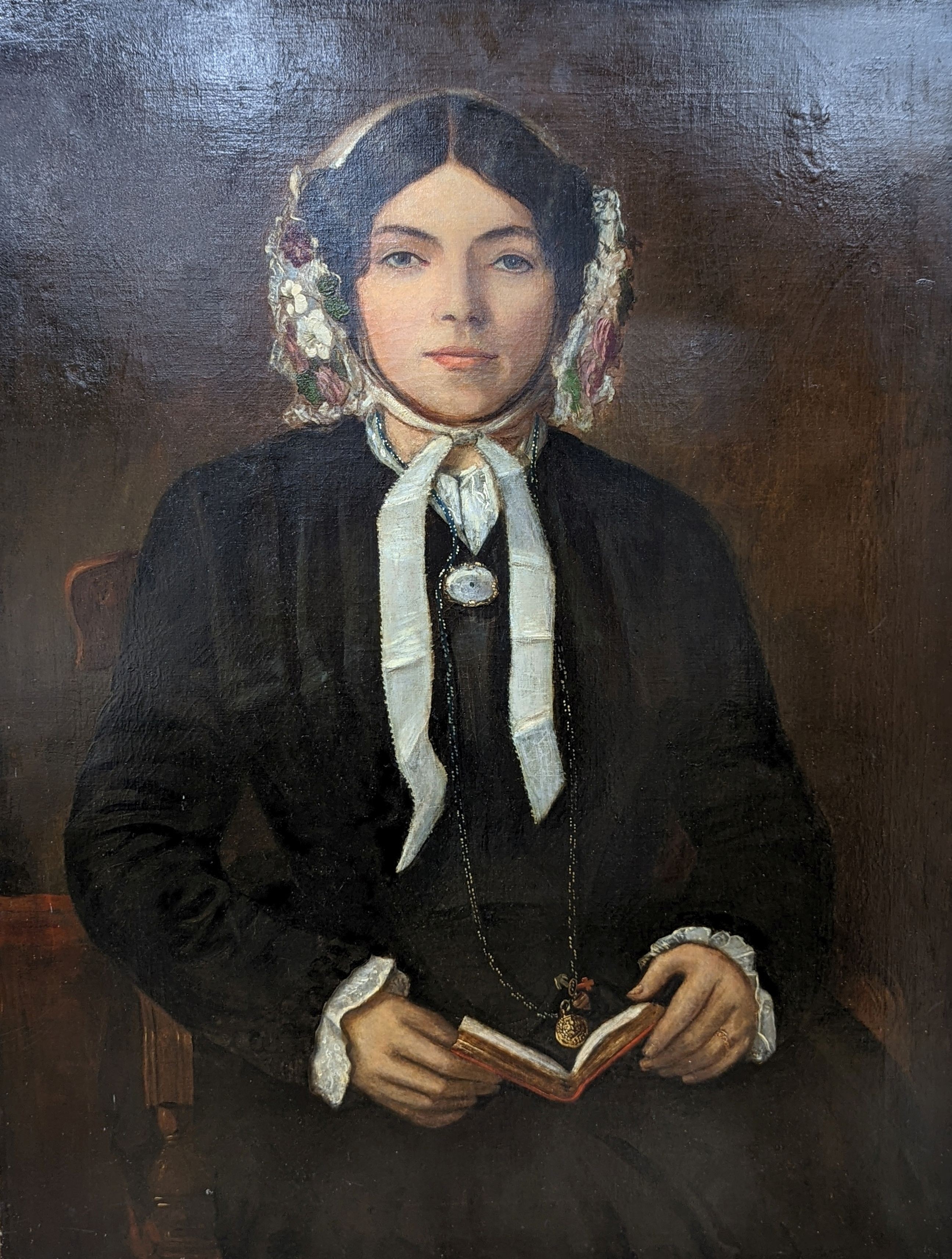 Victorian School, oil on canvas, Portrait of a young lady holding book, 92 x 71cm, unframed